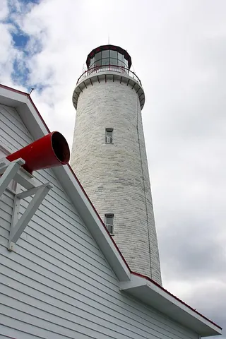 foghorn: a very loud low-pitched horn, used especially in lighthouses and on large boats