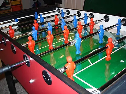 foosball: table soccer (US), table football (UK)