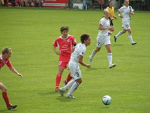 football: a sport played on foot in which teams attempt to get a ball into a goal or zone defended by the...