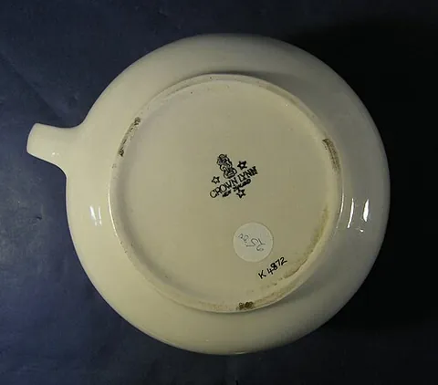 footrim: the usually circular ring at the base of a ceramic vessel that supports it on a surface and may...