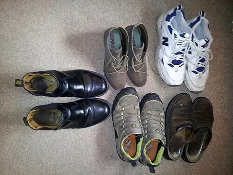 footwear: accesories or clothing that is worn on the foot; a shoe, sandal, etc