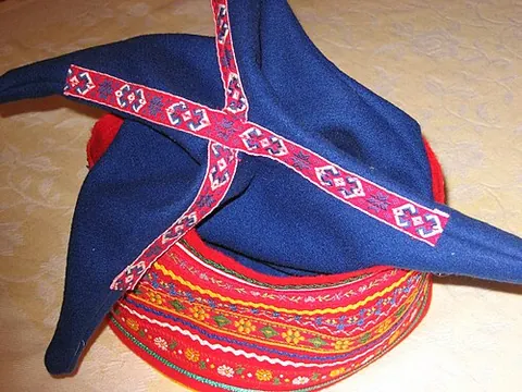four winds hat: a hat with four peaked flaps, worn by the Sami