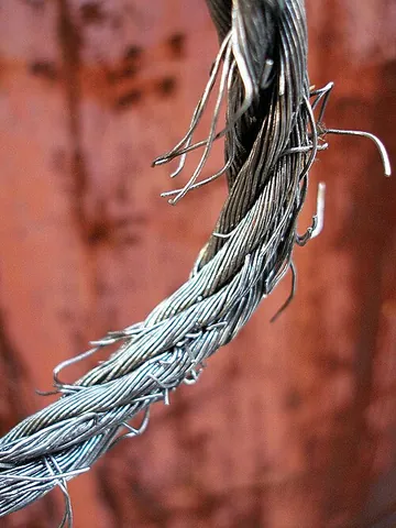 fray: to rub or wear away (something); to cause (something made of strands twisted or woven together,...
