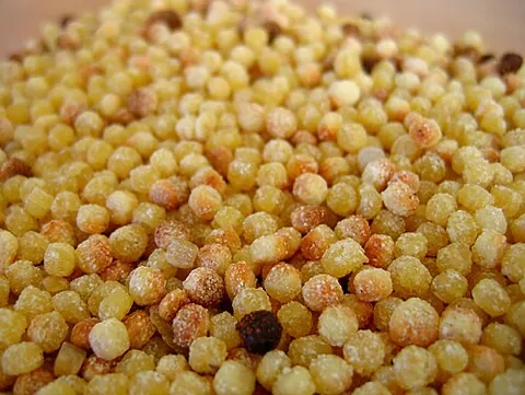 fregola: a type of pasta originating in Sardinia, resembling couscous and typically made with semolina flour
