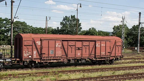 freight car: a railway wagon for carrying goods