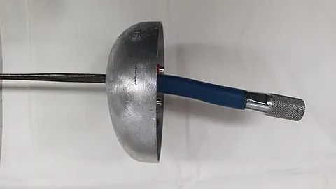 french grip: a grip used for foil and épée that consists of a slightly curved block of wood or aluminum wrapped...