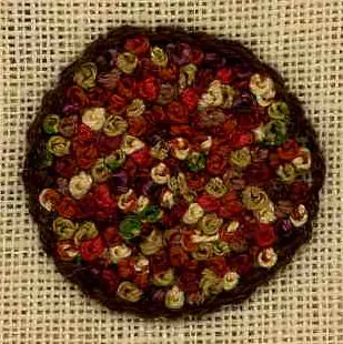 french knot: an embroidery stitch in which the thread is wound around the needle one or more times, and the...