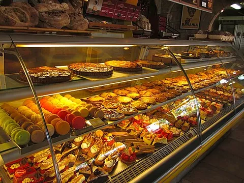 french pastry: a confection made from puff pastry often filled with fruit or custard