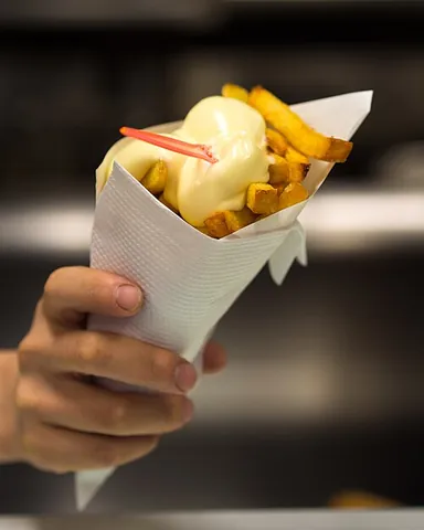 fritessaus: a Dutch condiment resembling sweetened mayonnaise, often served on French fries