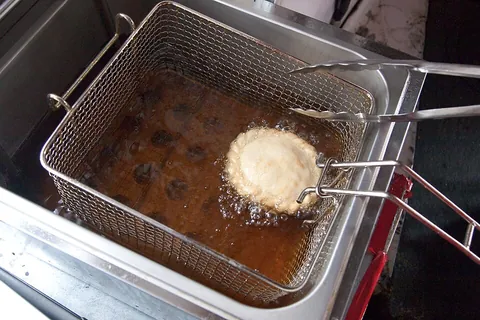 fryer: a machine or container for frying food