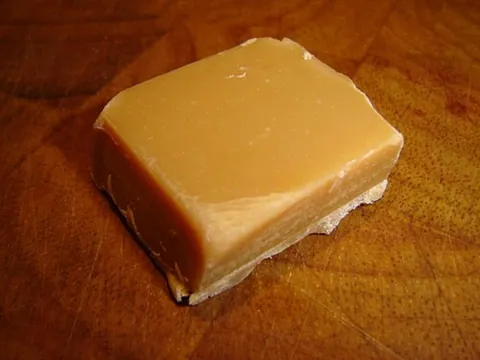 fudge: a type of very sweet candy or confection, usually made from sugar, butter, and milk or cream