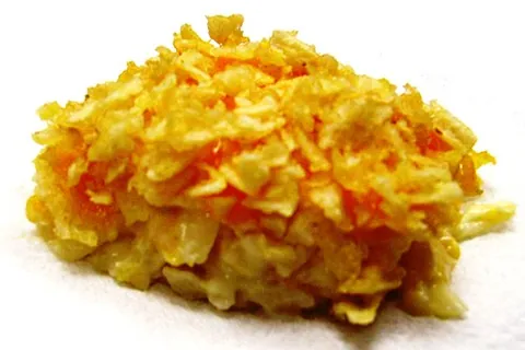 funeral potatoes: a casserole of hash browns or cubed potatoes, cheese, and onions, in a creamy soup or sauce