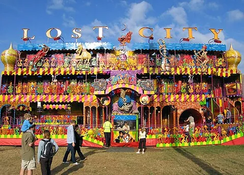 funhouse: a structure, usually at a circus or amusement park, enclosing several interactive attractions such...