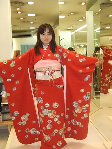 furisode: a style of colourful silk kimono distinguishable by its long sleeves, associated with the formal...