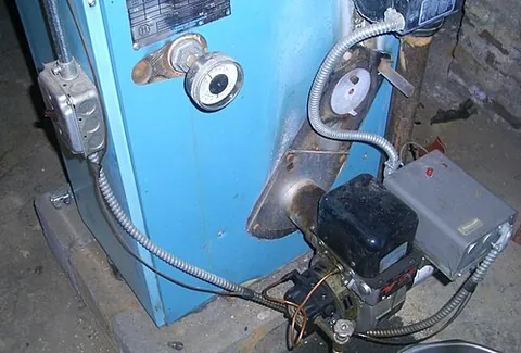 furnace: an industrial heating device, such as for smelting metal or firing ceramics