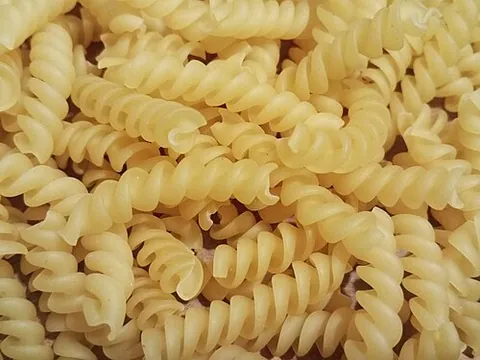 fusilli: pasta in the shape of short spirals