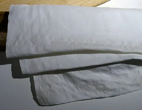 fustian: originally, a kind of coarse fabric made from cotton and flax; now, a kind of coarse twilled...