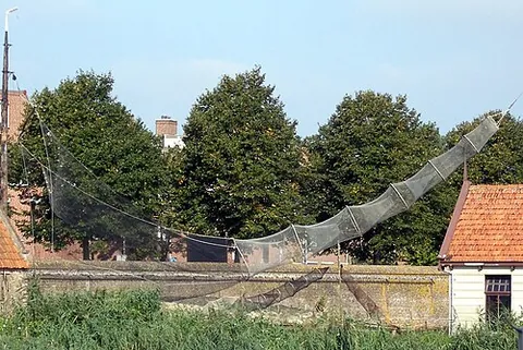 fyke: a type of fish-trap consisting of tubular nets that are supported by hoops