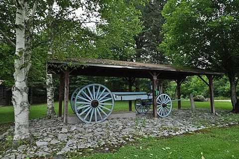 galamander: a customized horse- or ox-drawn stoneboat or wagon once used for hauling stone from quarries, with...