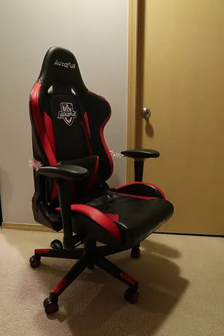 gaming chair: a type of ergonomic chair specifically designed and marketed for video gamers to provide comfort...