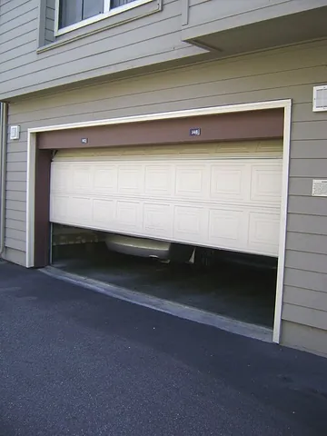 garage door: the large door on a garage which a car can come in through