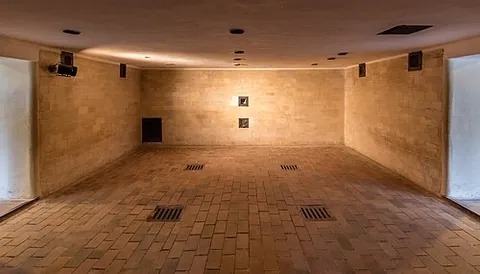 gas chamber: a sealed chamber in which people are executed with poison gas