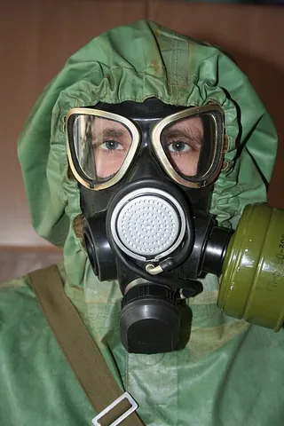 gas mask: a covering for the face with a filter to protect the user from poison gas