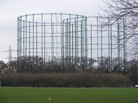 gasholder: a large cylindrical tank used for storing gas, especially town gas (1870s-1940s) or natural gas...
