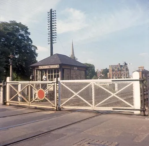 gate box: a signal box that controls a level crossing