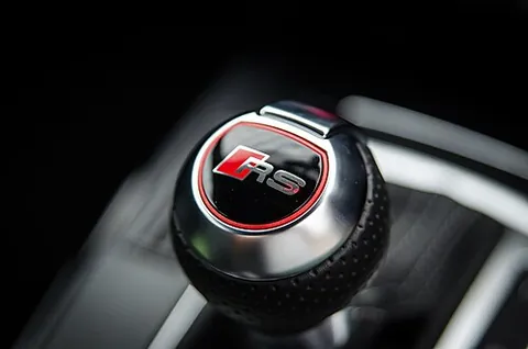 gearknob: a knob that forms the handle for the gear lever on a car with manual transmission