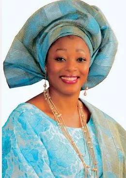 gele: a traditional head tie native to Yoruba women of West Africa (Nigeria, Benin and Togo)