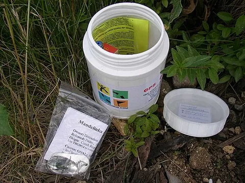 geocache: a container hidden in a specific location during geocaching