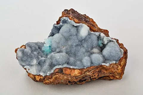 geode: a nodule of stone having a cavity lined with mineral or crystal matter on the inside wall
