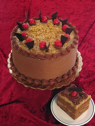 german chocolate cake: a layered chocolate cake filled and topped with coconut-pecan frosting