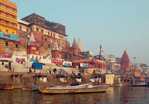 ghat: a descending path or stairway to a river; a ford or landing-place