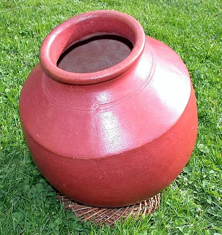 ghatam: an earthenware pot used as a percussion instrument in the Carnatic music of South India