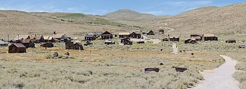 ghost town: a town which has become deserted, usually due to failing economic activity, especially one that...