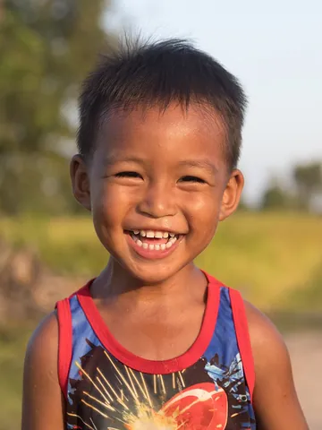 giggle: to laugh gently in a playful, nervous, or affected manner