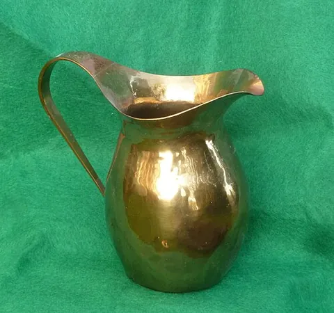 gilding metal: a tough kind of brass from which artillery shells, as well as some jewellery, are made
