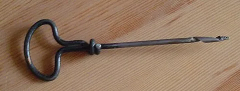 gimlet: a small screw-tipped tool for boring holes