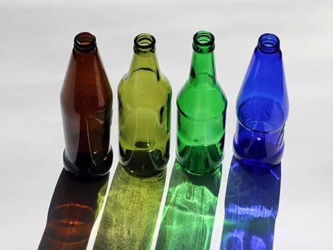 glass bottle: a container made of glass, typically with a narrow neck, used for holding liquids or other...