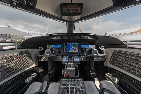 glass cockpit: an aircraft cockpit with its avionics displayed on computer screens, rather than on gauges