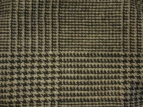 glen plaid: a woolen fabric with a woven twill design of large and small checks, usually in muted colours such...