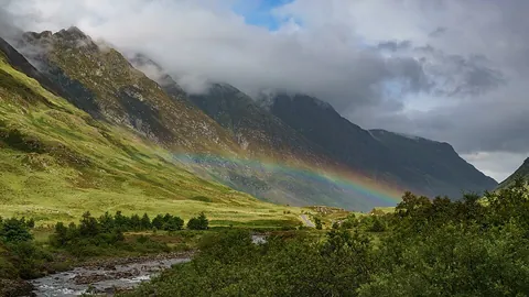 glen: a secluded and narrow valley, especially one with a river running through it; a depression between...