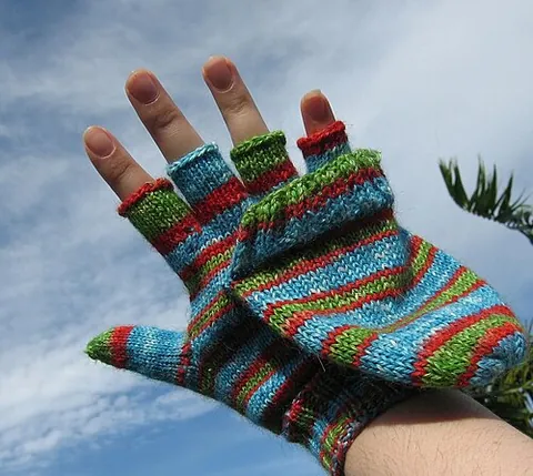 glitten: a cross between a glove and a mitten, often in the form of a fingerless glove with an attached...