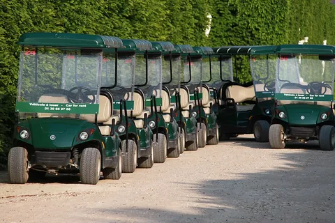 golf cart: a small four-wheeled motorized vehicle, archetypally used to travel around a golf course and also...