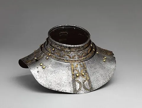gorget: a piece of armour protecting the throat and/or the upper part of the chest
