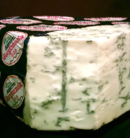 gorgonzola: a blue-veined Italian cheese, made from cow's milk