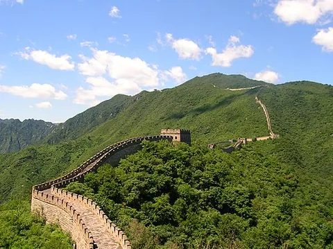 great wall of china: an ancient Chinese fortification, almost 4,000 miles long, originally designed to protect China...