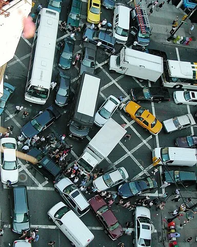 gridlock: a condition of total, interlocking traffic congestion on the streets or highways of a crowded city,...